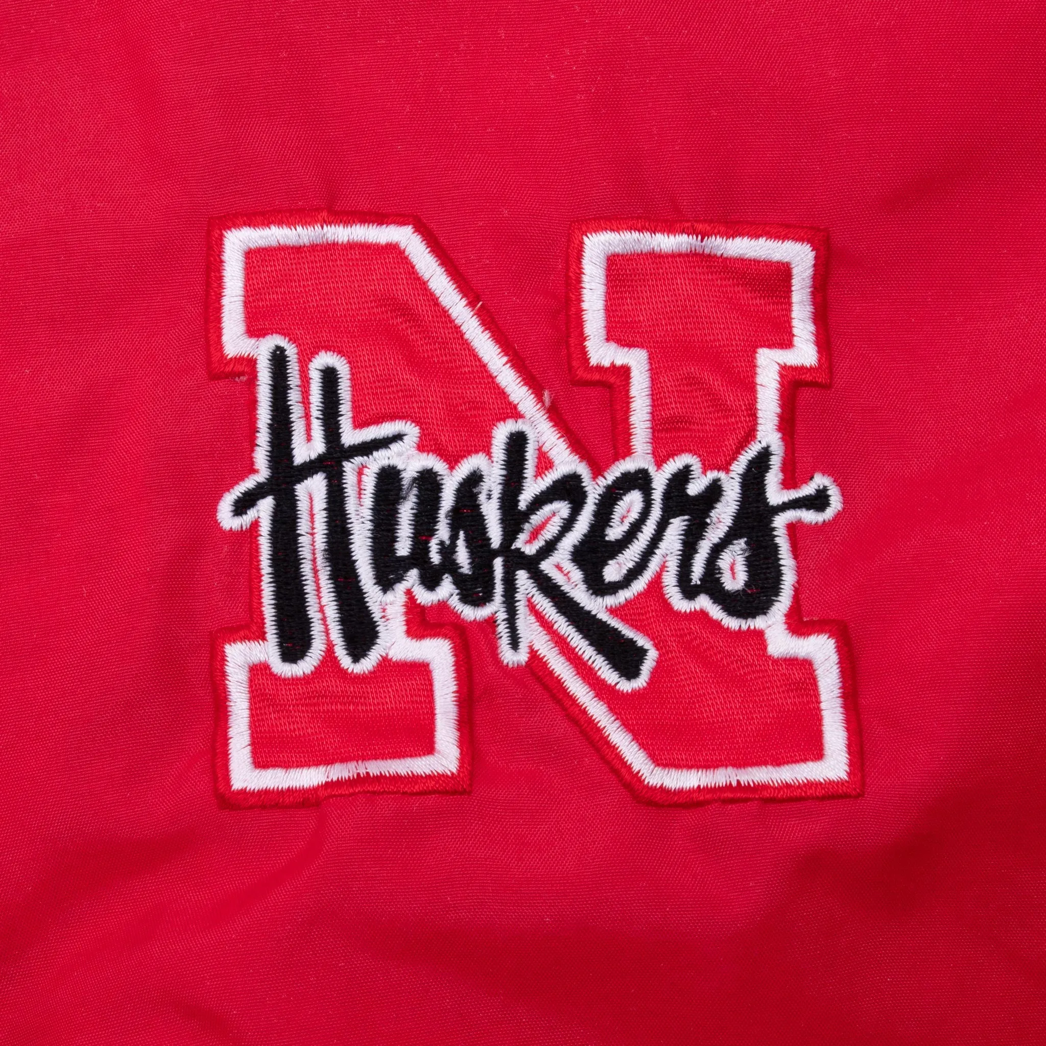 VINTAGE NCAA NEBRASKA HUSKERS PRO PLAYER BOMBER JACKET 1990S 2XL